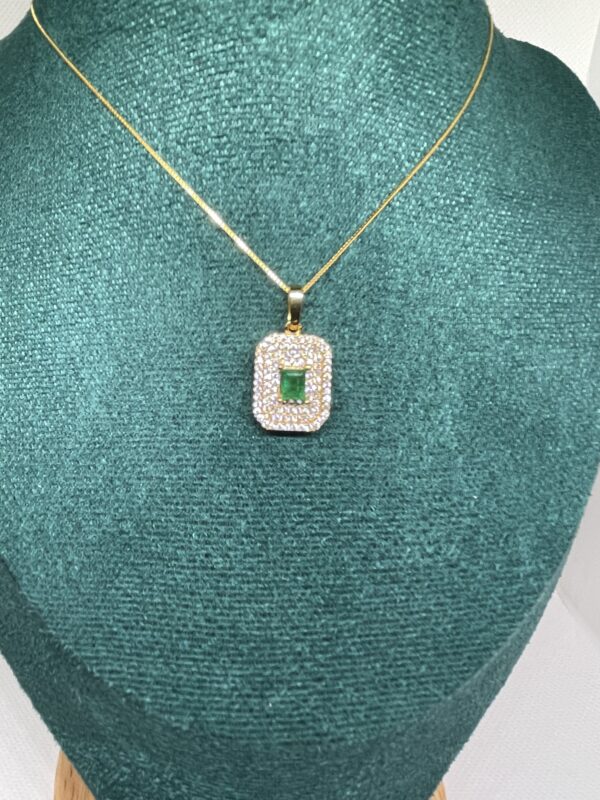 Grace in Every Detail: Emerald Halo Pendant